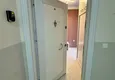 Dostępny zakup Apartament w Mahmutlar częściowo umeblowany z przeszklonym balkonem i widokiem na morze 1 