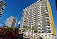 Kupić Jednopokojowy apartament z nowymi meblami, oddzielną kuchnią i 2 balkonami w Mersin, Tomyuk 1