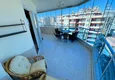 Dostępny zakup Apartament w Mahmutlar częściowo umeblowany z przeszklonym balkonem i widokiem na morze 14 