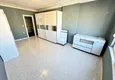 Dostępny zakup Apartament w Mahmutlar częściowo umeblowany z przeszklonym balkonem i widokiem na morze 15 