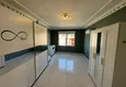 Dostępny zakup Apartament w Mahmutlar częściowo umeblowany z przeszklonym balkonem i widokiem na morze 17 