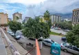 Dostępny zakup Dwupokojowy apartament w centrum Mahmutlar z widokiem na góry 24
