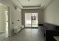 Dostępny zakup Jednopokojowy apartament z nowymi meblami, oddzielną kuchnią i 2 balkonami w Mersin, Tomyuk 3