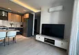 Dostępny zakup Stylowy apartament z 2 sypialniami i widokiem na góry w centrum Teje, Mersin 2 