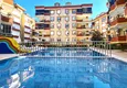 Kupić Apartament 2+1 z meblami i przeszklonym balkonem zaledwie 300 metrów od morza, dzielnica Oba - Alanya 2