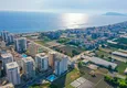 Kupić Apartament z dwiema sypialniami z meblami i oddzielnym apartamentem kuchennym w Mahmutlar 2