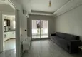 Dostępny zakup Jednopokojowy apartament z nowymi meblami, oddzielną kuchnią i 2 balkonami w Mersin, Tomyuk 4