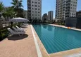 Kupić Stylowy apartament z 2 sypialniami i widokiem na góry w centrum Teje, Mersin 2 
