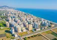 Kupić Apartament z dwiema sypialniami z meblami i oddzielnym apartamentem kuchennym w Mahmutlar 3