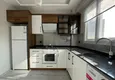 Dostępny zakup Jednopokojowy apartament z nowymi meblami, oddzielną kuchnią i 2 balkonami w Mersin, Tomyuk 6