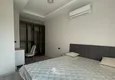 Dostępny zakup Jednopokojowy apartament z nowymi meblami, oddzielną kuchnią i 2 balkonami w Mersin, Tomyuk 9
