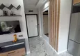 Dostępny zakup Apartament z jedną sypialnią pod klucz z przeszklonym balkonem od właściciela w centrum Mezitli 1