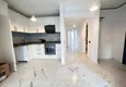 Dostępny zakup PILNA SPRZEDAŻ: W pełni odnowiony apartament z dwiema sypialniami w dzielnicy Menderes, Mezitli 2