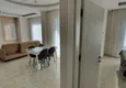 Dostępny zakup Apartament 1+1 w Mahmutlar z meblami i widokiem na góry 3