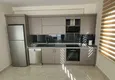 Dostępny zakup Apartament 1+1 w Mahmutlar z meblami i widokiem na góry 5