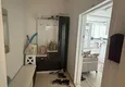 Dostępny zakup Apartament z dwiema sypialniami i przeszklonym balkonem w Mersin, dzielnica Tomyuk 1 