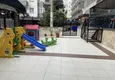 Kupić Umeblowany apartament z widokiem na góry w centrum Alanyi, w pobliżu plaży Kleopatra. Nieruchomość na zezwolenie na pobyt 7 