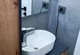 Dostępny zakup Apartament z jedną sypialnią pod klucz z przeszklonym balkonem od właściciela w centrum Mezitli 8
