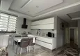 Dostępny zakup Apartament z dwiema sypialniami i przeszklonym balkonem w Mersin, dzielnica Tomyuk 3 