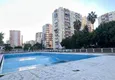 Kupić PILNA SPRZEDAŻ: W pełni odnowiony apartament z dwiema sypialniami w dzielnicy Menderes, Mezitli 9