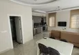 Dostępny zakup Apartament 1+1 w Mahmutlar z meblami i widokiem na góry 9