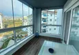 Dostępny zakup Apartament 1+1 w Mahmutlar, pod klucz z przeszklonym balkonem w nowoczesnym kompleksie 12 