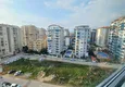 Dostępny zakup Apartament 1+1 w Mahmutlar, pod klucz z przeszklonym balkonem w nowoczesnym kompleksie 13 