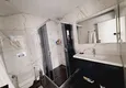 Dostępny zakup Apartament w Alanyi, dzielnica Tosmur - nowoczesne wnętrze, widok na morze i rzekę Dim 13