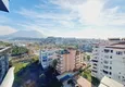 Dostępny zakup Apartament w Alanyi, dzielnica Tosmur - nowoczesne wnętrze, widok na morze i rzekę Dim 19