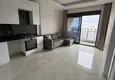 Dostępny zakup Apartament 1+1 z meblami i widokiem na morze, dzielnica Mahmutlar — Alanya  1 
