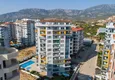 Kupić Apartament 1+1 w Mahmutlar, pod klucz z przeszklonym balkonem w nowoczesnym kompleksie 1 