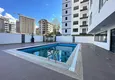 Kupić Dwupoziomowy penthouse z doskonałym wykończeniem w nowym kompleksie - dzielnica Mahmutlar, Alanya 1 