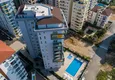 Kupić Apartament 1+1 w Mahmutlar, pod klucz z przeszklonym balkonem w nowoczesnym kompleksie 3 