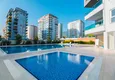Kupić Apartament 1+1 w Mahmutlar, pod klucz z przeszklonym balkonem w nowoczesnym kompleksie 4 