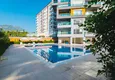 Kupić Apartament 1+1 w Mahmutlar, pod klucz z przeszklonym balkonem w nowoczesnym kompleksie 5 
