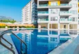 Kupić Apartament 1+1 w Mahmutlar, pod klucz z przeszklonym balkonem w nowoczesnym kompleksie 6 