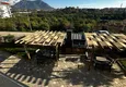 Dostępny zakup Nowoczesny apartament pod klucz z jedną sypialnią w nowym kompleksie — Alanya, dzielnica Oba  7 