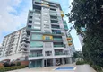 Kupić Apartament 1+1 w Mahmutlar, pod klucz z przeszklonym balkonem w nowoczesnym kompleksie 8 