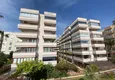 Kupić Umeblowany apartament z 1 sypialnią nad morzem w Mahmutlar, Alanya 6