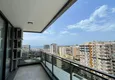 Dostępny zakup Dwupokojowy apartament z panoramicznym widokiem na morze i góry w centrum Mahmutlar 14 