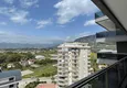 Dostępny zakup Dwupokojowy apartament z panoramicznym widokiem na morze i góry w centrum Mahmutlar 15 