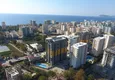 Kupić Dwupokojowy apartament z panoramicznym widokiem na morze i góry w centrum Mahmutlar 1 