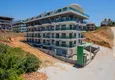 Kupić Dwupoziomowy penthouse 2+1 z nowymi meblami i widokiem na góry w Oba, Alanya 9 