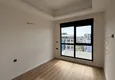 Dostępny zakup Nowoczesny apartament z dwiema sypialniami i widokiem na góry w kompleksie mieszkalnym na poziomie hotelu, Mahmutlar - Alanya 10