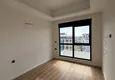 Dostępny zakup Nowoczesny apartament z dwiema sypialniami i widokiem na góry w kompleksie mieszkalnym na poziomie hotelu, Mahmutlar - Alanya 11