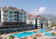 Kupić Dwupoziomowy penthouse 3+1 z otwartymi widokami w prestiżowym kompleksie Cikcilli — odpowiedni do uzyskania zezwolenia na pobyt 1