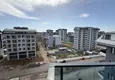Dostępny zakup Nowoczesny apartament z dwiema sypialniami i widokiem na góry w kompleksie mieszkalnym na poziomie hotelu, Mahmutlar - Alanya 21