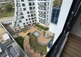 Dostępny zakup Nowoczesny apartament z dwiema sypialniami i widokiem na góry w kompleksie mieszkalnym na poziomie hotelu, Mahmutlar - Alanya 24