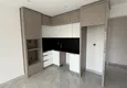 Dostępny zakup Nowoczesny apartament z dwiema sypialniami i widokiem na góry w kompleksie mieszkalnym na poziomie hotelu, Mahmutlar - Alanya 4