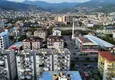 Kupić Apartament 2+1 po remoncie kosmetycznym w kompleksie miejskim przy głównej ulicy Oba 4